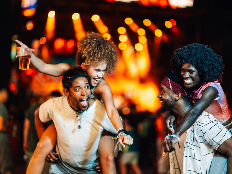 Friends enjoying night out at a vibrant festival