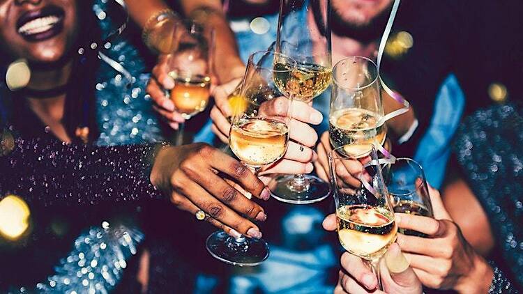 New Year Group of patrons cheersing New Year Group of patrons cheersing