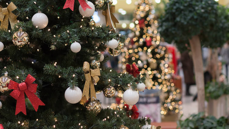 Christmas tree with decorations in shopping mall Christmas tree with decorations