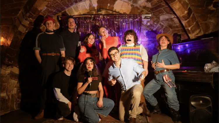 people on stage at cabaret show 