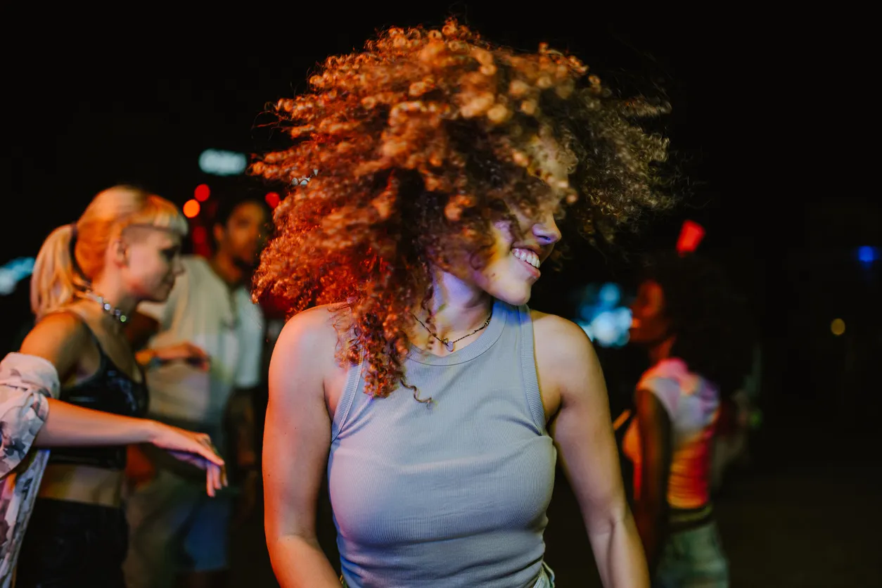 Woman dancing at a nightclub party
