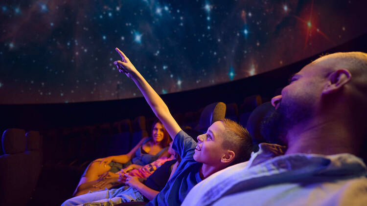 Dome Under Film Festival Melbourne Planetarium people watching a film at the Melbourne Planetarium Dome Under Film Festival