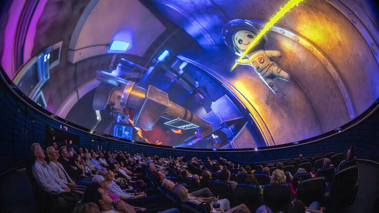 Dome Under Film Festival Melbourne Planetarium people watching a film of the dome of the Melbourne Planetarium