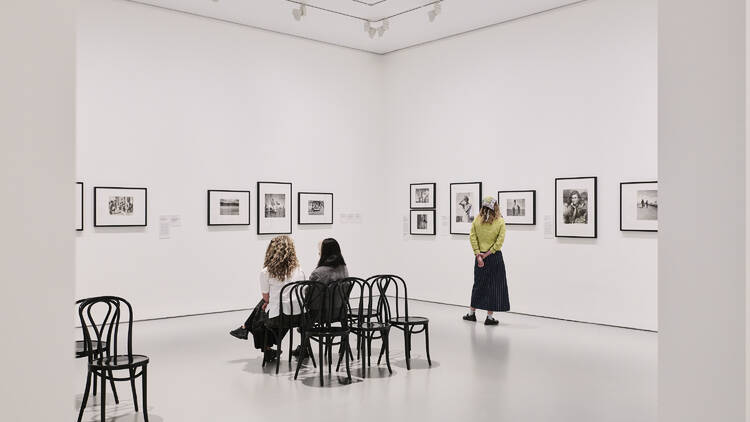 Women Photographers 1900–1975 People at the NGV's 'Women Photographers 1900–1975' exhibition.