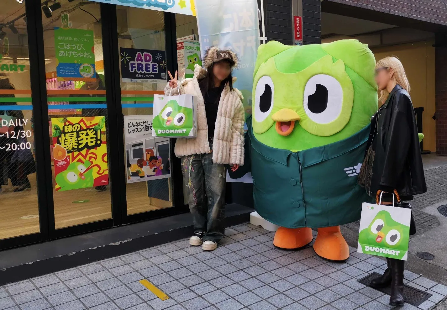 Two people posing with Duo