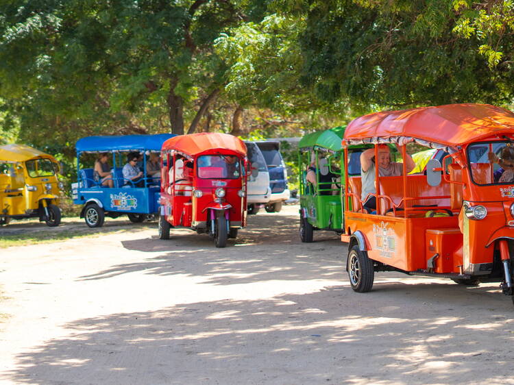 Take an island tour on a tuk-tuk