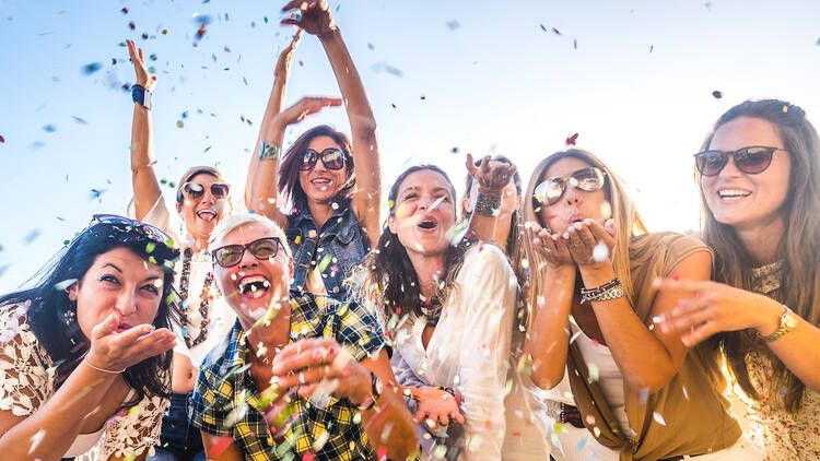 Group of happy people having fun during celebration party 1200145880