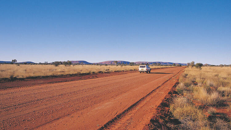 Car travelling along the Gunbarrel Highway