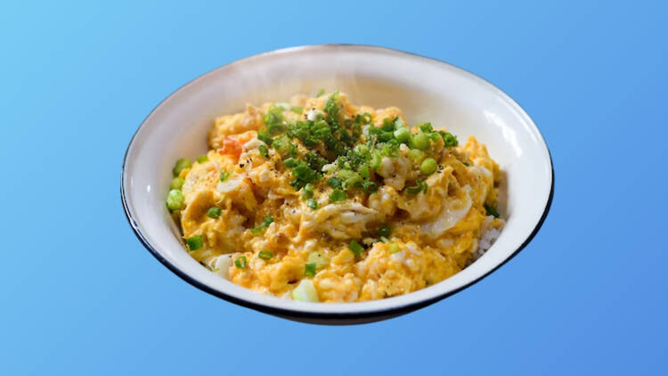 Fried egg with minced shrimp over rice