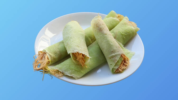 Roti saimai (roti with cotton candy-like sugar)