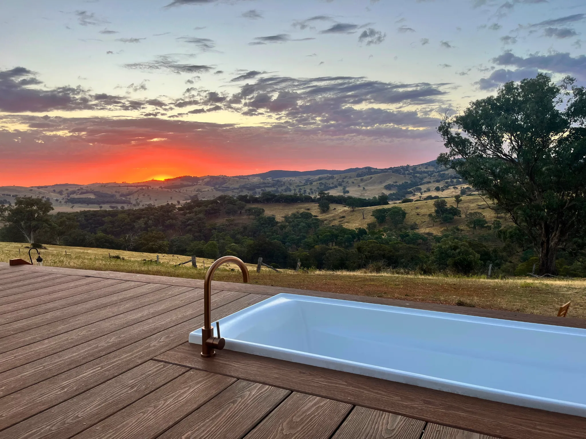 Outdoor bath at sunset