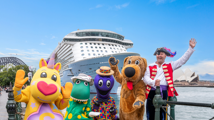 Wiggles characters in front of cruise ship