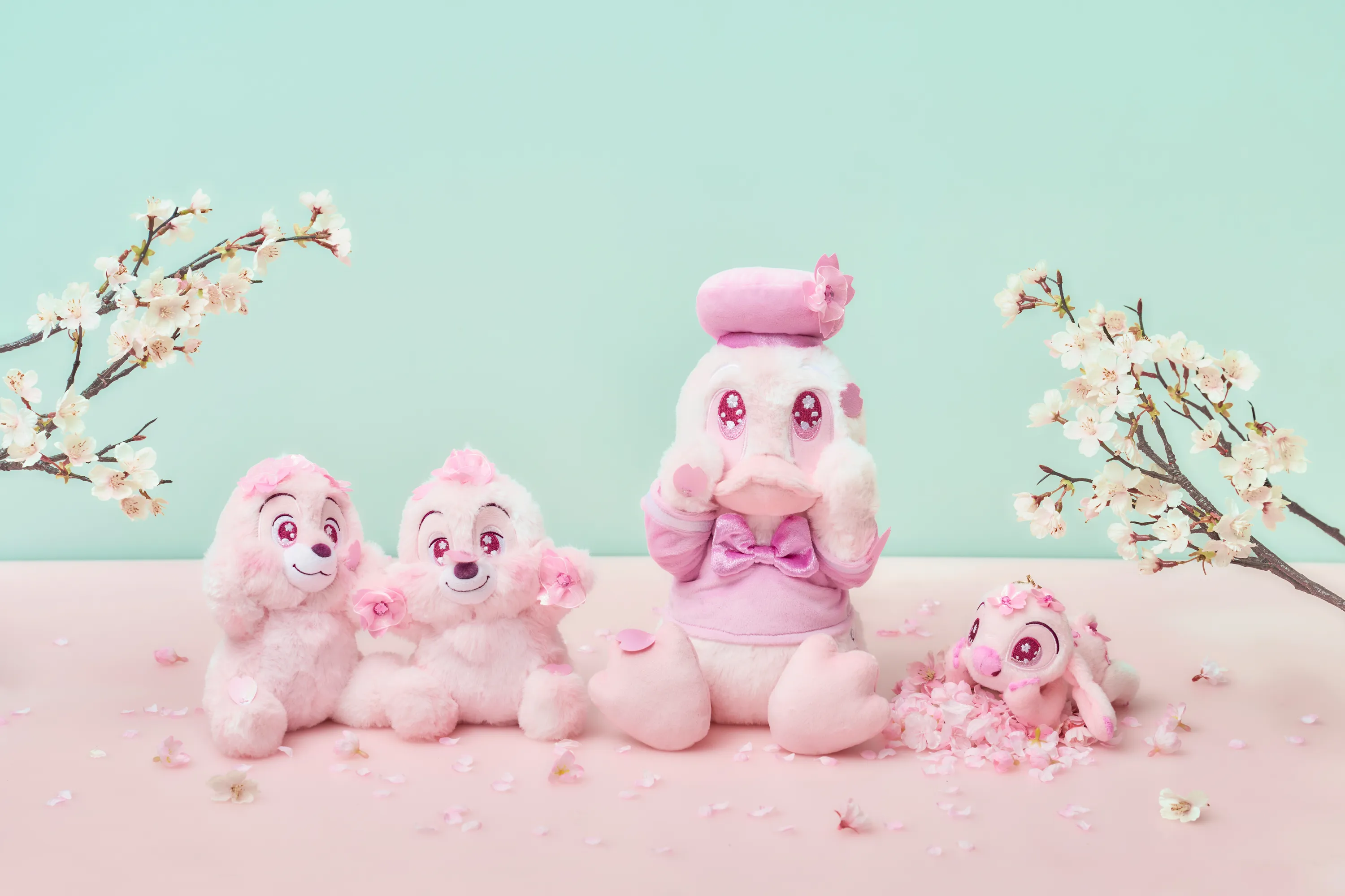 Pink Disney character plushies