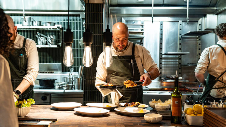 Chefs working in the kitchen at Marmelo.