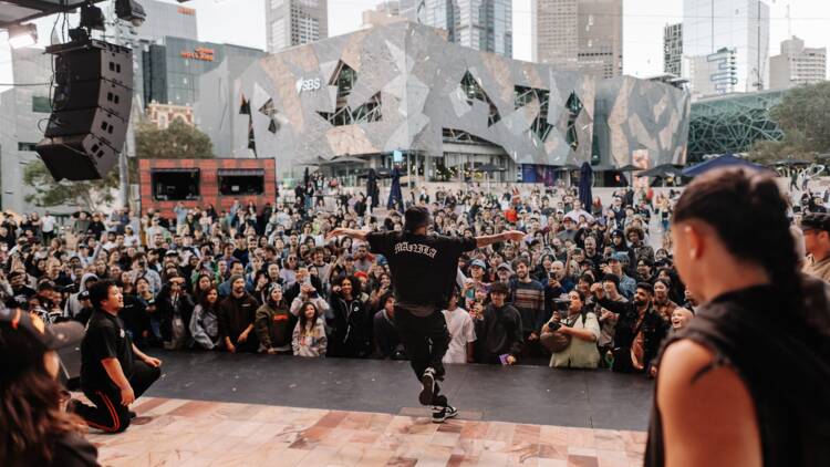 Street dancing on a stage at Fed Square.