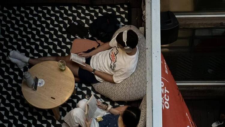 Swap solitary reading for conversation over To Kill a Mockingbird