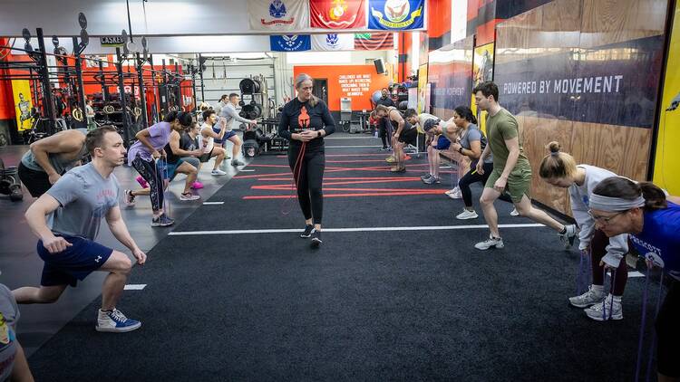 A group of people exercising at an Andersonville-based gym.