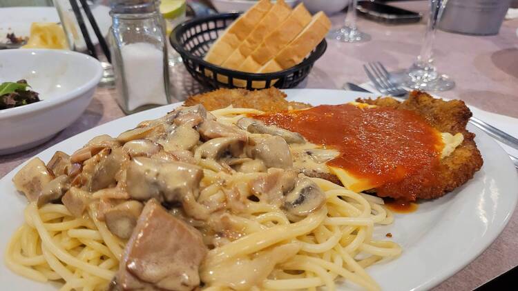 Spaghetti and schnitzel on a plate