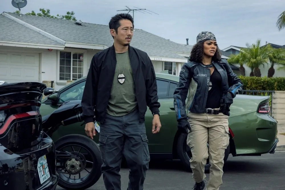 Photograph: Warrick Page/Netflix | Steven Yeun and Teyana Taylor in The Rip