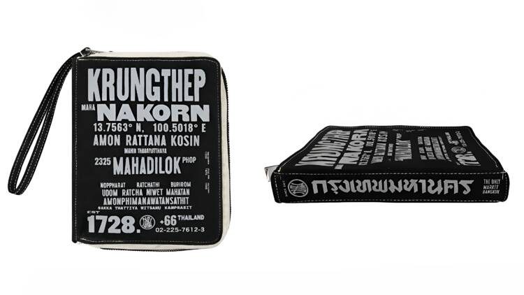 Book-shaped clutch spelling out Bangkok’s ridiculously long official name