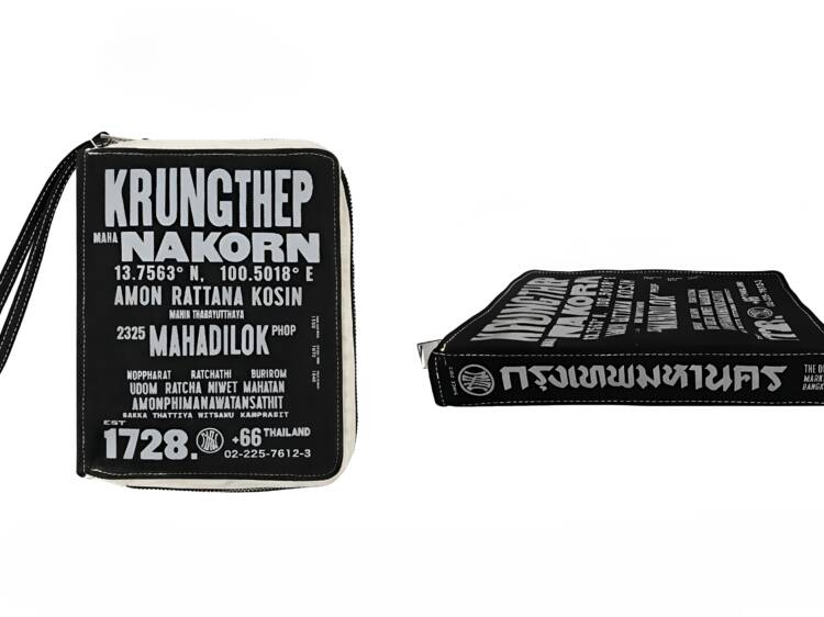 Book-shaped clutch spelling out Bangkok’s ridiculously long official name
