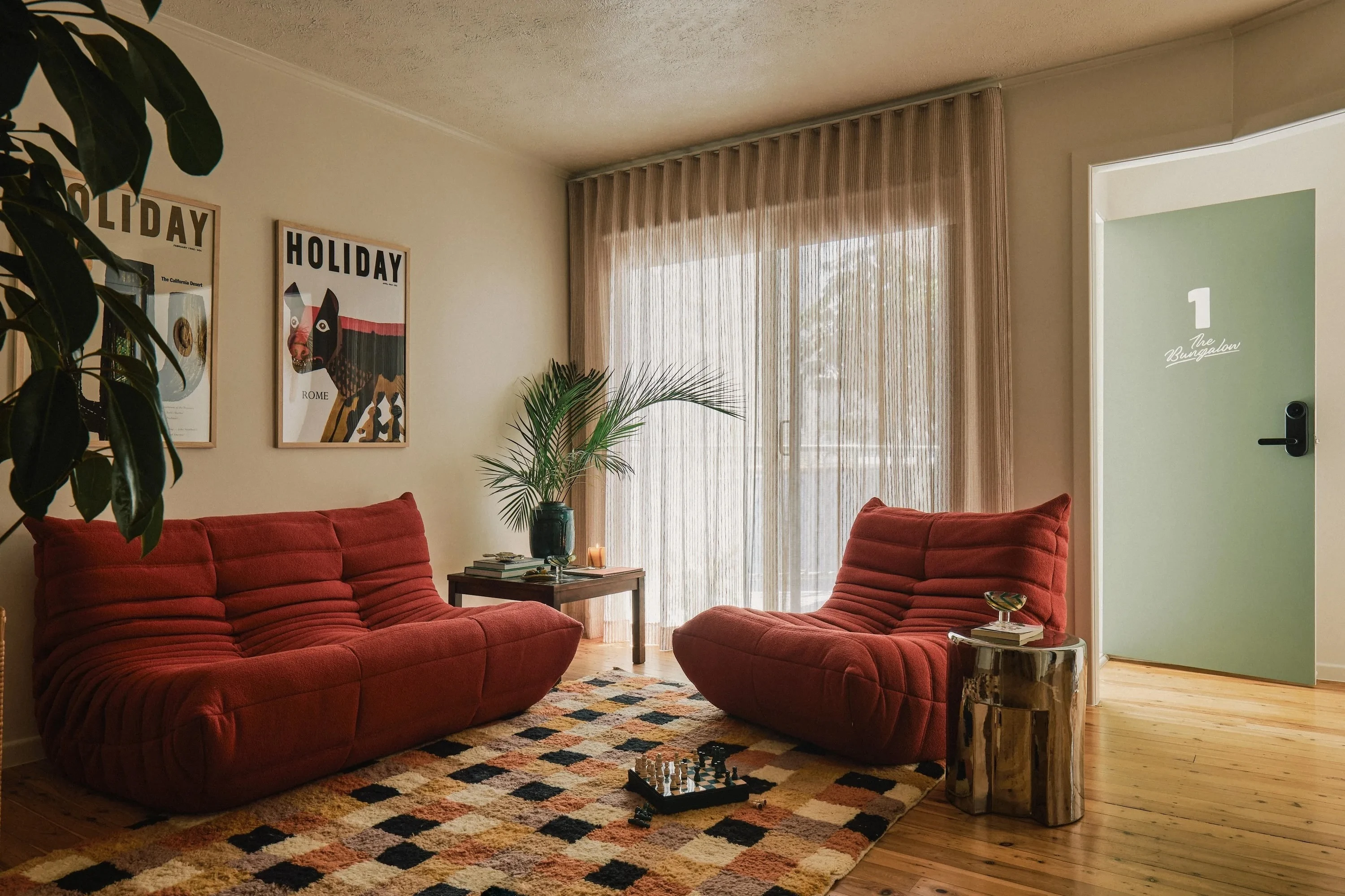 Room with red sofas