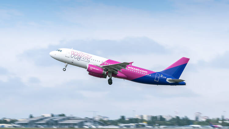 Wizz Air aeroplane taking off from airport