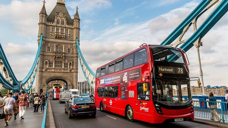 Red bus on Tower Bridge in London