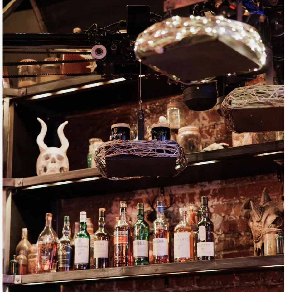 The zip-line sending drinks from bar 