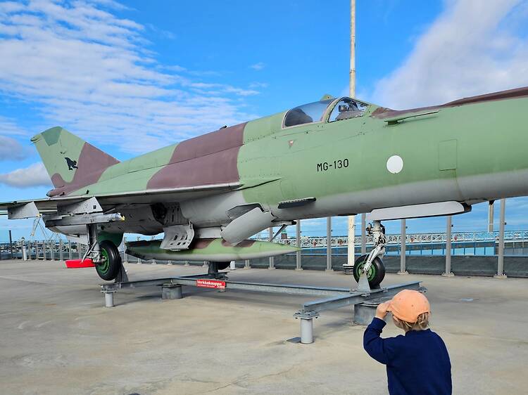 Take in the views and a real fighter jet on a rooftop