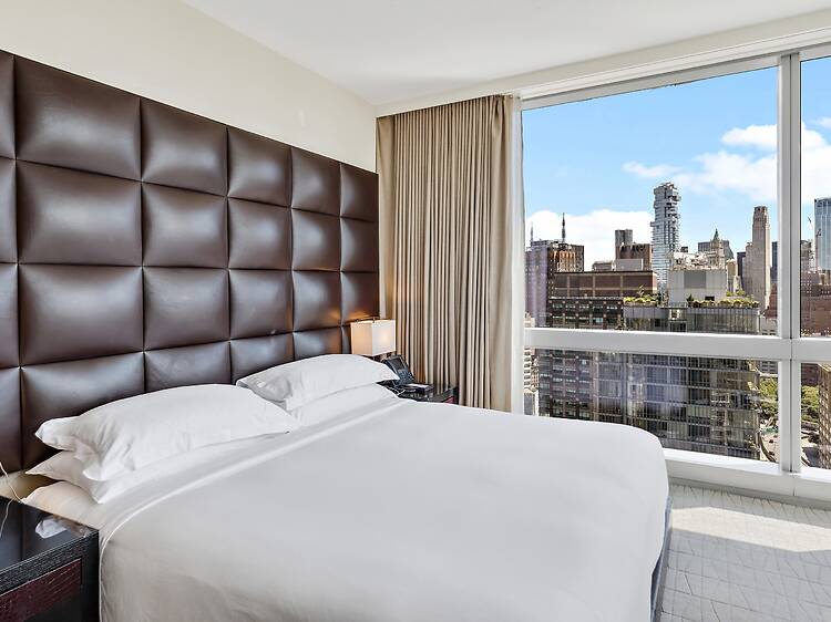 NYC is officially coming for hotel “junk fees” and the timing is no accident