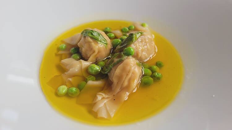 Dumplings in a yellow broth