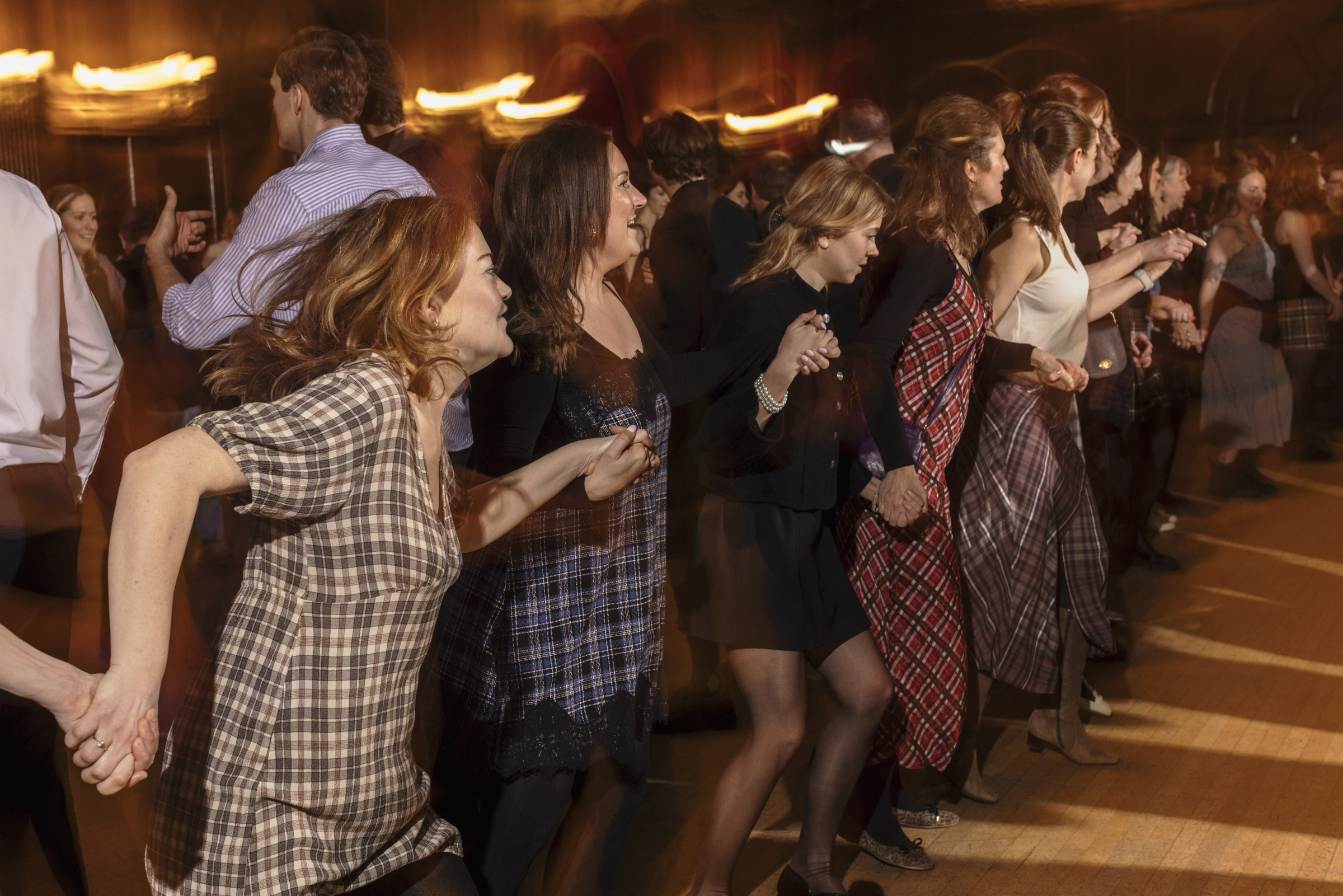 People holding hands in a line 