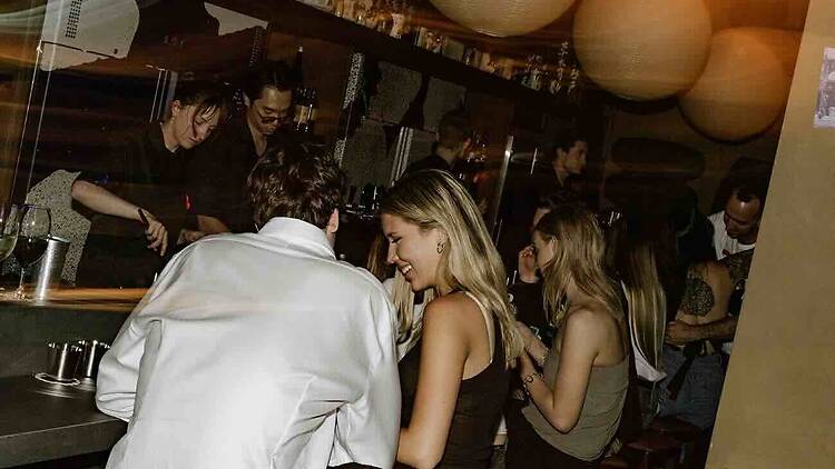 People sitting down at Sakura House