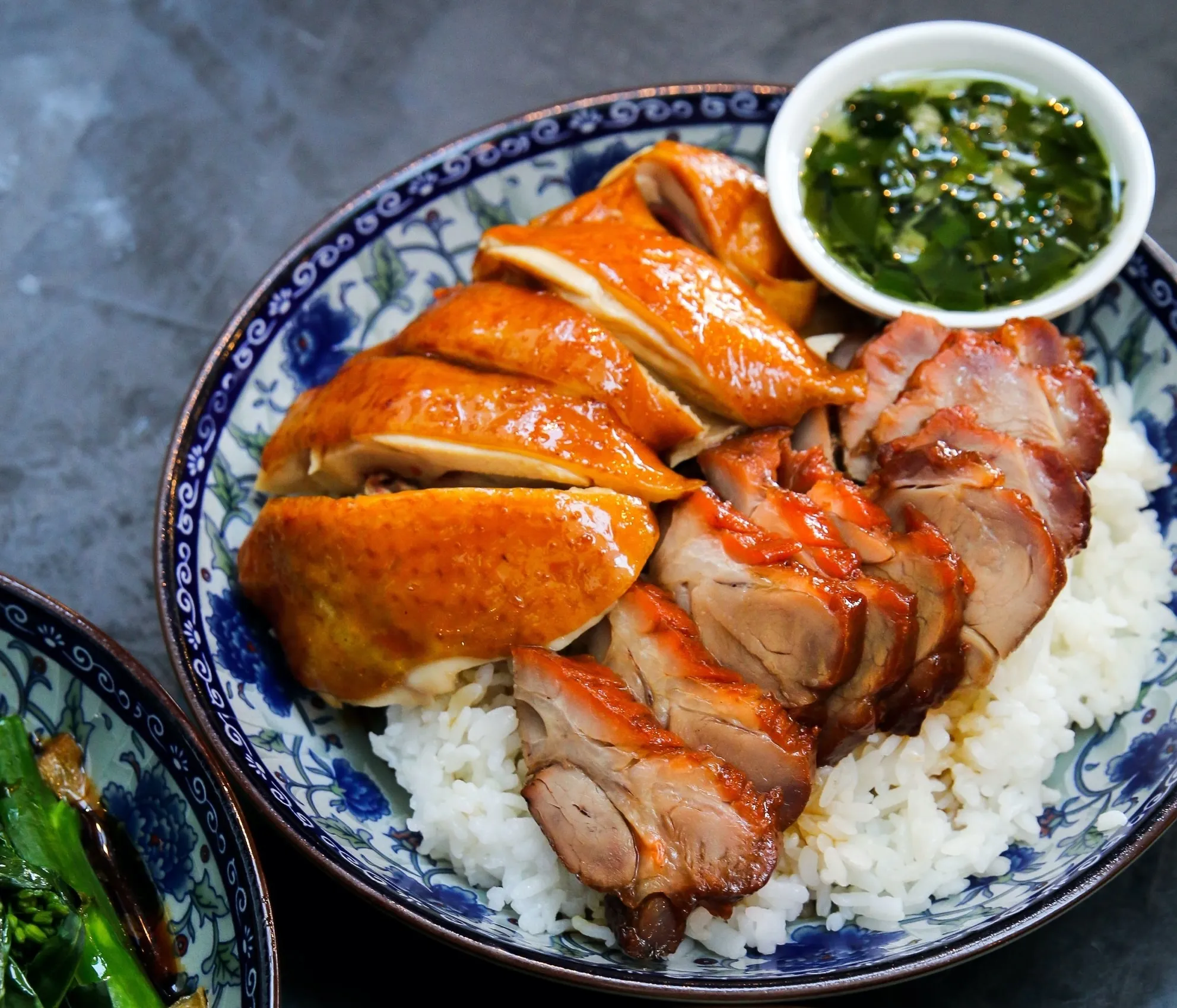 A plate of Chinese BBQ by Heritage at Time Out Market Vancouver