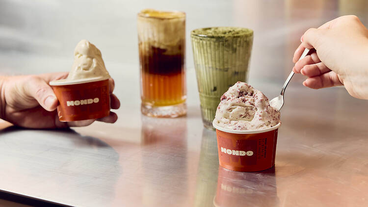 Assorted cups of gelato and iced drinks at Mondo Gelateria.