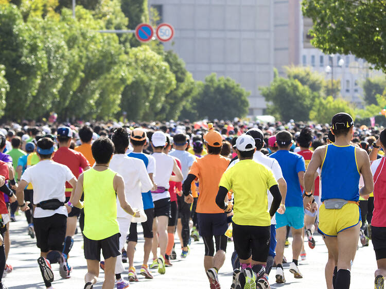 Osaka Marathon runners in central Osaka Osaka Marathon runners in central Osaka