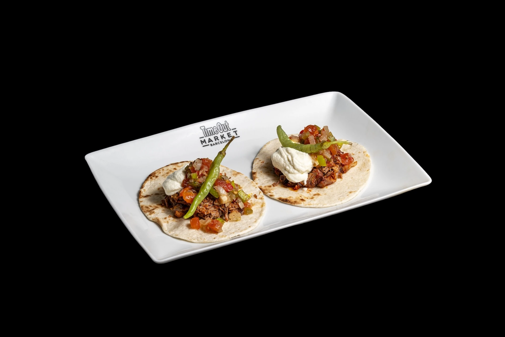 Taco de jackfruit rostit amb crema agra fumada i pico de gallo