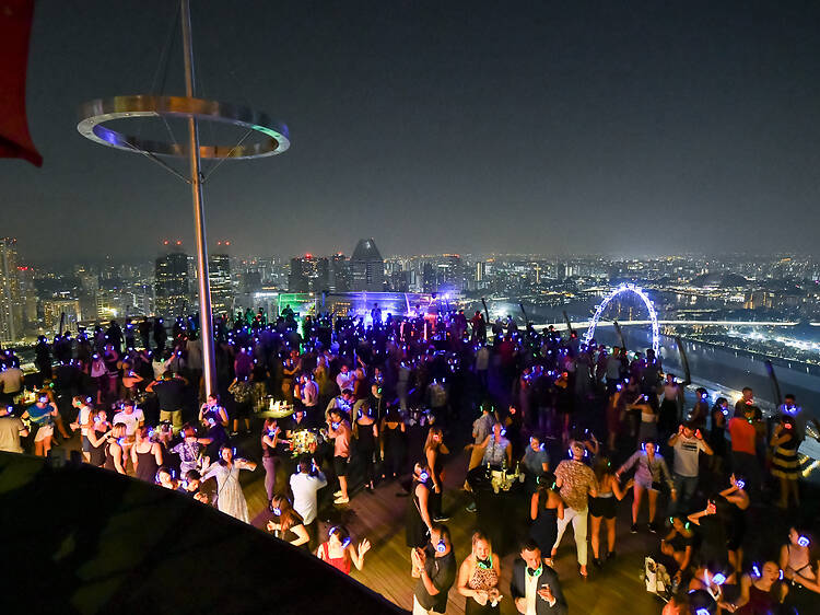 Party atop the Marina Bay Sands at Silent Disco in the Sky