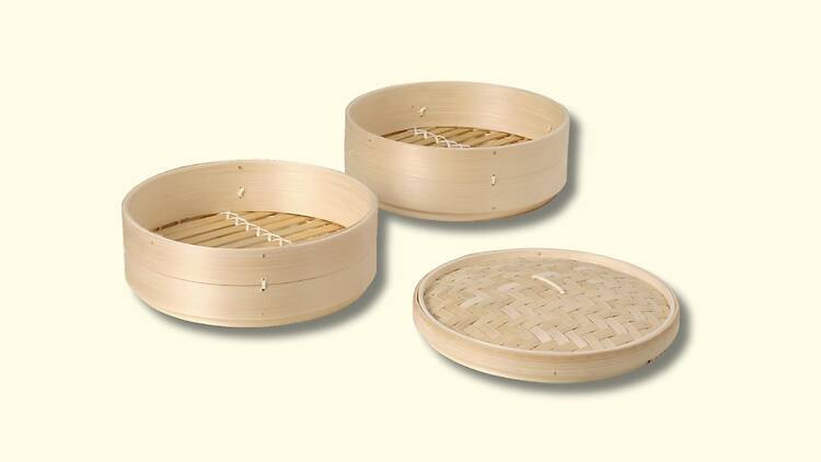 Um cesto de dim sum Um cesto de dim sum