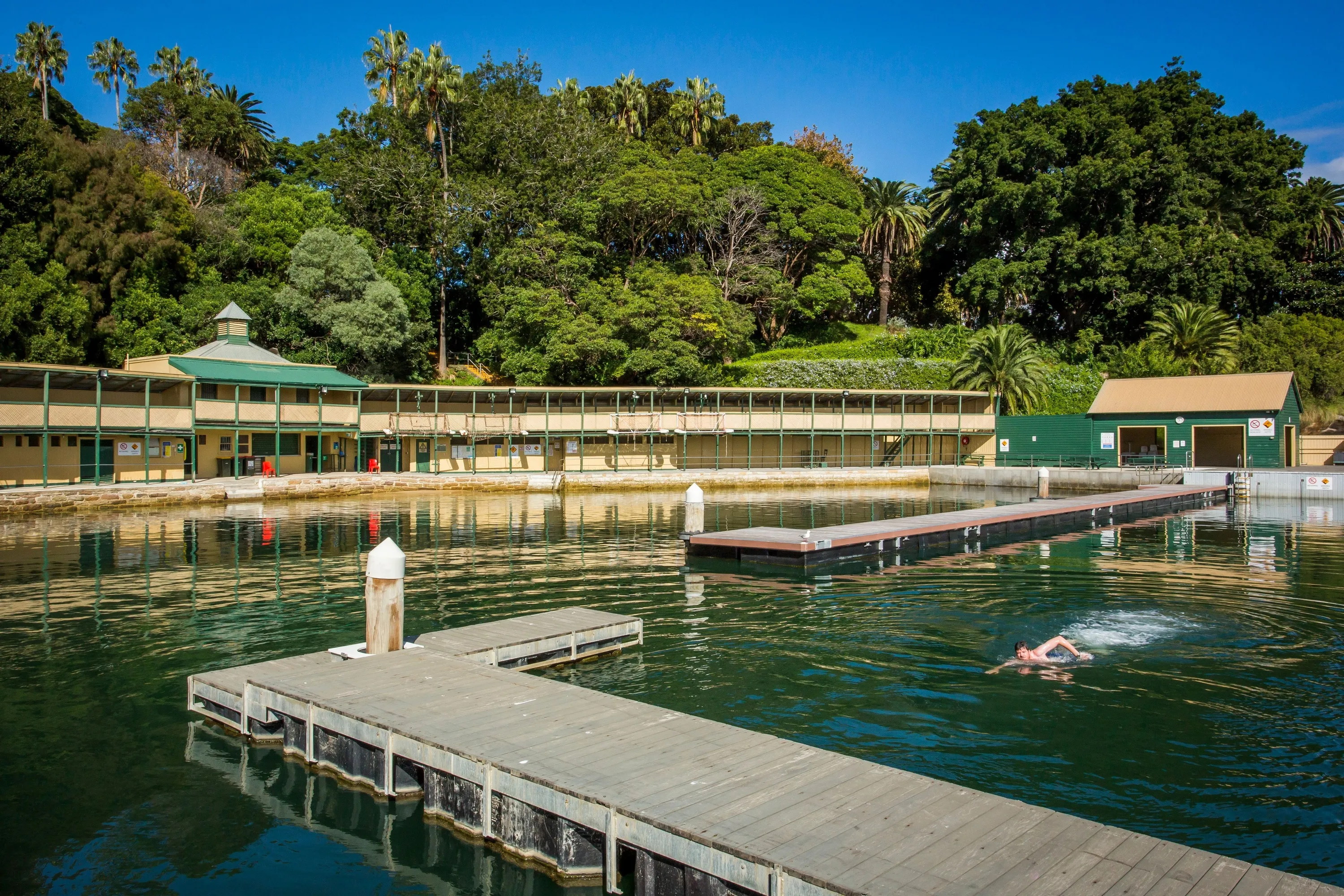Man enjoying a swim in the Dawn Fraser Baths in Elkington Park, Balmain.