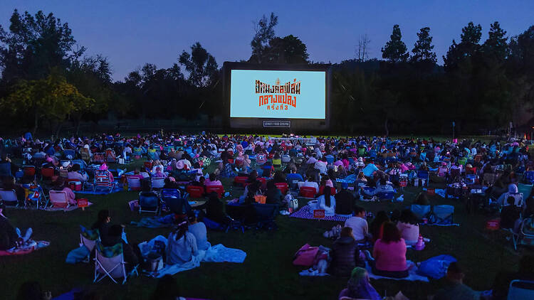 Settle on mats for nine free films at Sahamongkol's Kasetsart University outdoor cinema ritual