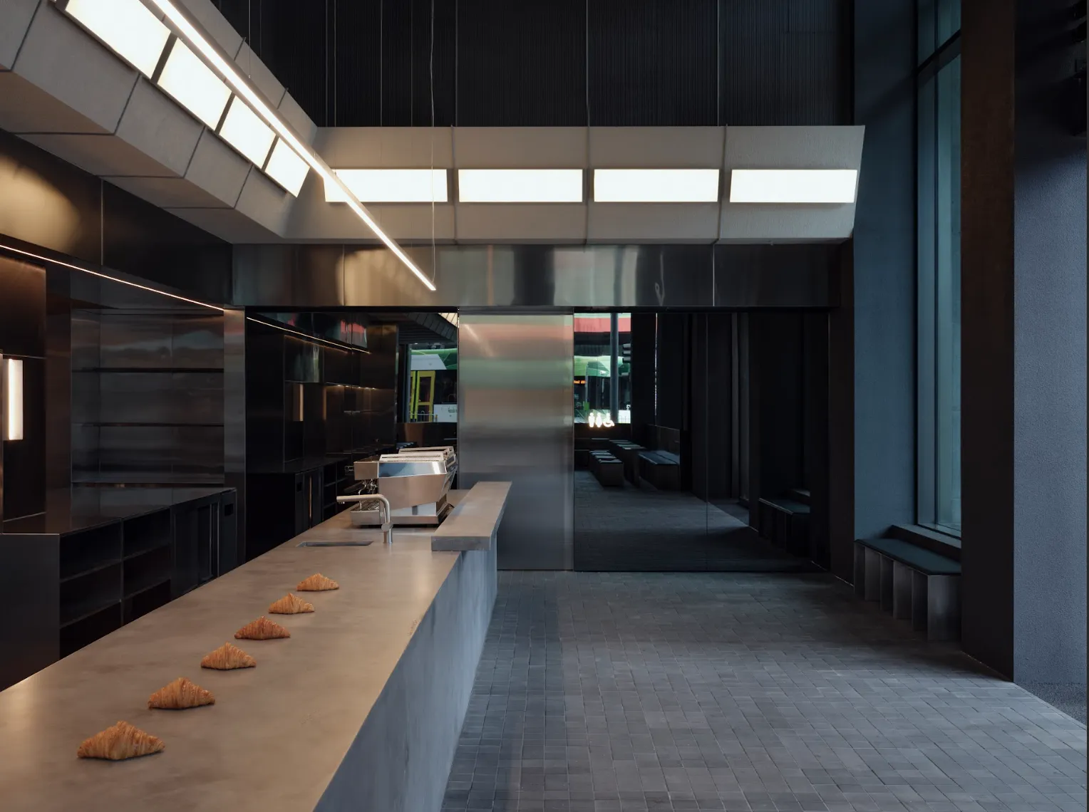 Interior of grey industrial bakery space