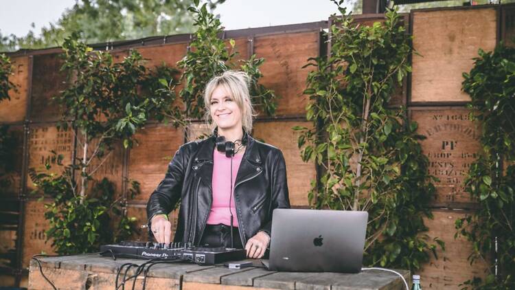 Female DJ smiling