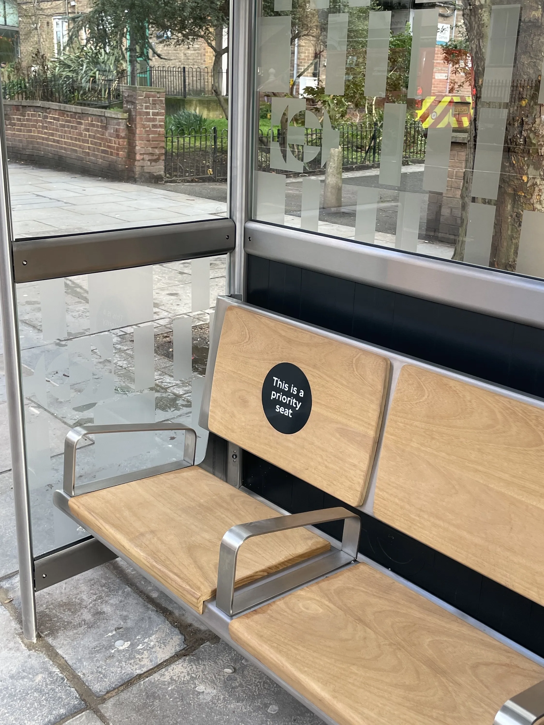 Bus shelter with priority seating in London 