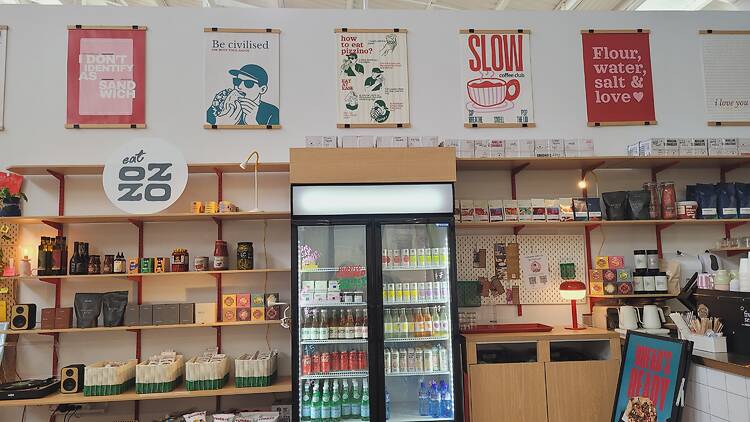 A cafe with groceries on the shelves