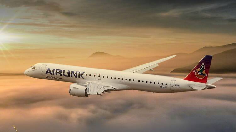 Airlink Plane flying through the clouds.