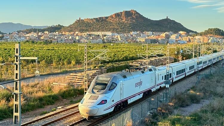 High-speed AVE train in motion on Valencia high-speed railway.