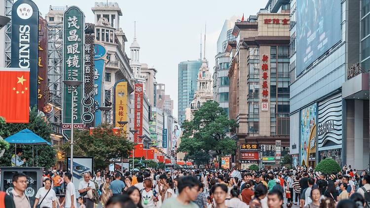 Shanghai, China - Oct 05 2025: During the 2025 National Day and Mid-Autumn Festival Golden Week holiday, there was a constant stream of Chinese and foreign tourists on Nanjing Road in Shanghai.