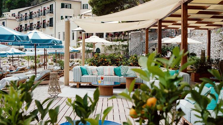 Beach Bar and lounge area at Lido Villeggiatura, A Villa Sant'Andrea Beach Club